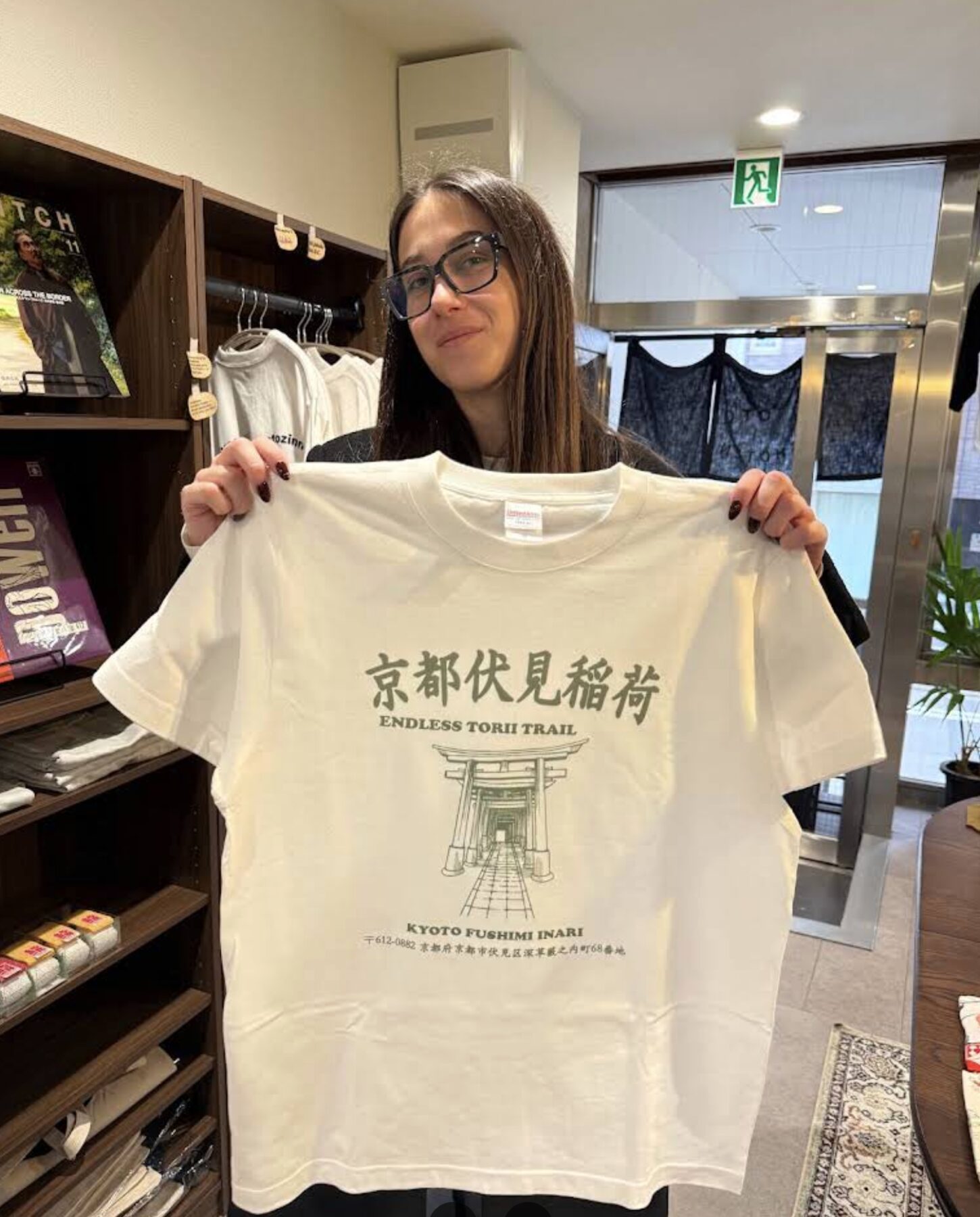 Guest wearing a custom Fushimi Inari torii-trail Kyoto Shoten T-shirt