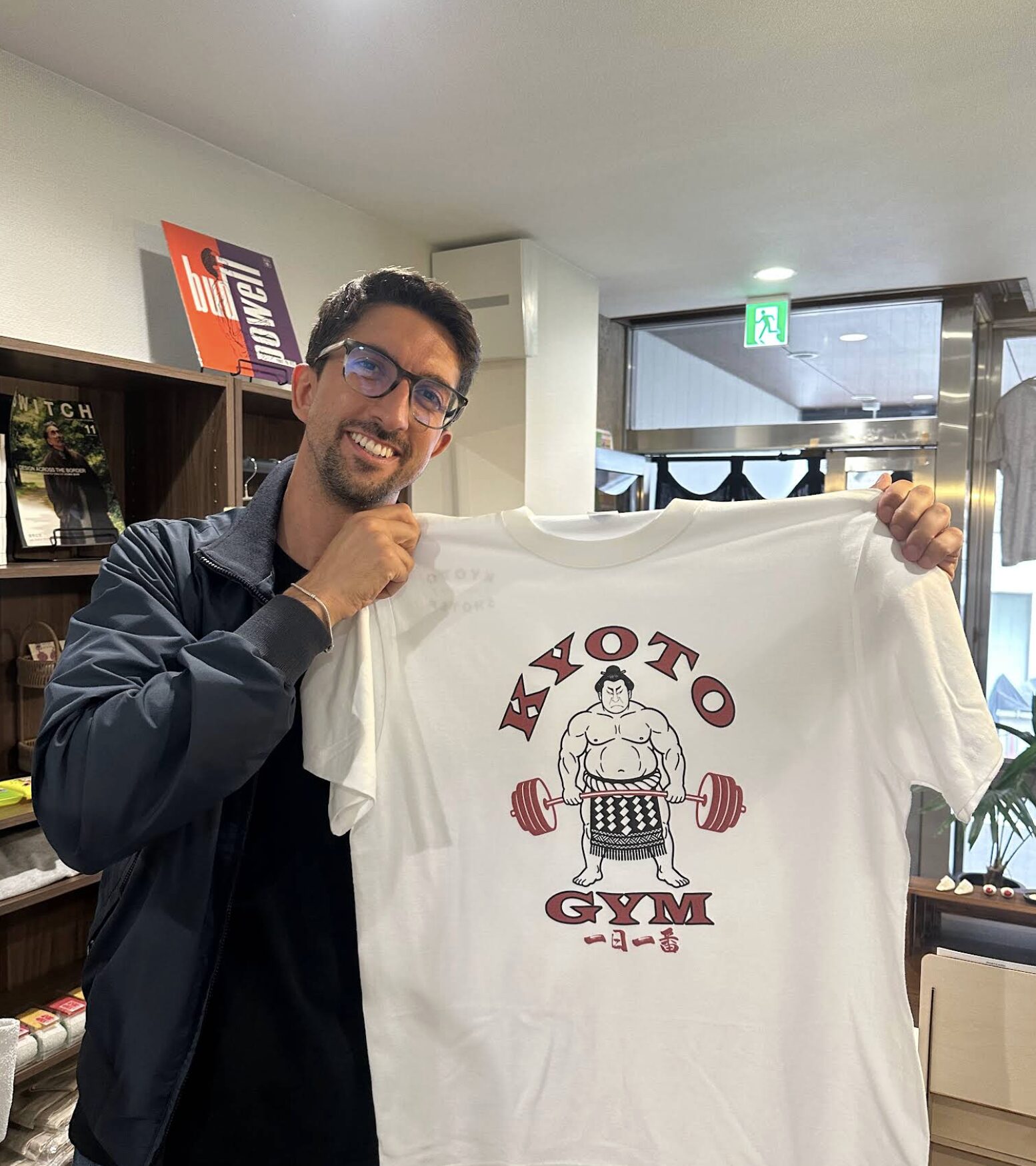 Guest wearing a custom Kyoto Gym sumo illustration T-shirt